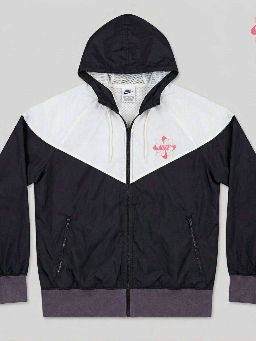 Vintage Nike Track & Field Windrunner Jacket — Black & White Pinwheel Logo